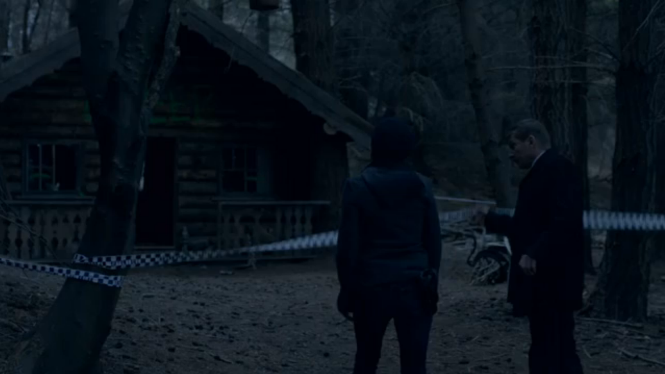 Elisabeth Moss and David Wenham approach a crime scene in TOP OF THE LAKE. In half-seen, no-key scenes, sound design can illuminate action details.