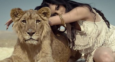 Helly Luv in the music video for her hit Kurdish independence song, "Risk It All."