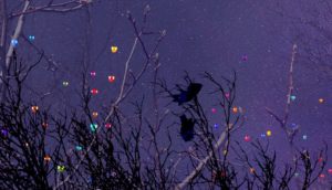Colorful clay entities float through the sky in Evan Bode's short Thine Own Self