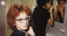Nan Goldin in the bathroom with roommate, Boston (courtesy of Nan Goldin)