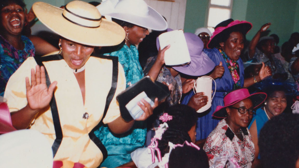 A photograph taken of Black South Africans at a church celebration during the apartheid era.