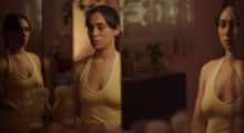 A woman stands in front of a triptych of mirrors, each slightly distorting her body's reflection.