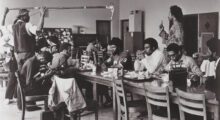 Production still from the shoot of Let the Church Say Amen! (St. Clair Bourne standing at right)