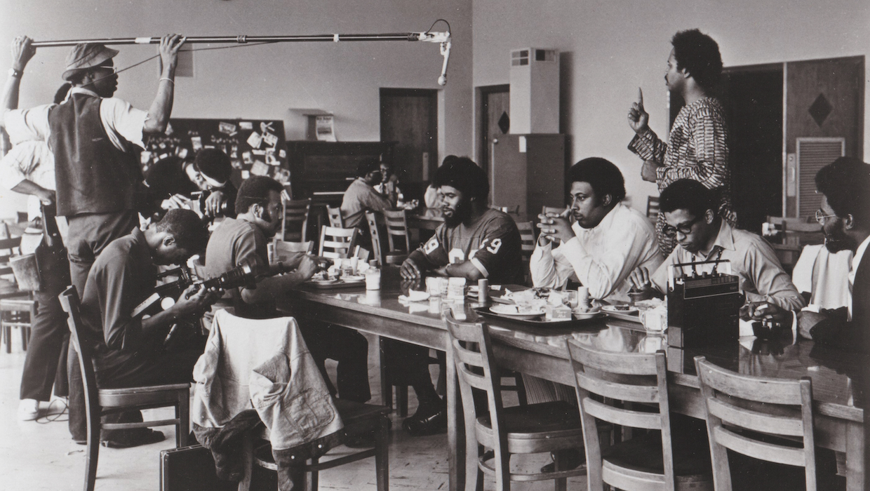 Production still from the shoot of Let the Church Say Amen! (St. Clair Bourne standing at right)