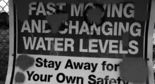 A warning sign about water levels.