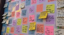 A series of post-it notes in bright colors read words of hope and resilience for the people of Minneapolis. In the center, one vitally reads: Do Not Look Away.