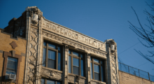 The facade of an old building in Ridgewood, Queens that reads: Ridgewood Theater.